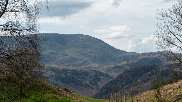 Harrison Stickle, Langdale Pikes in Lake District. View of mountains with a cloudy sky