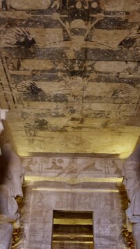 Ancient Egyptian wall paintings with detailed hieroglyphs and ritual scenes inside the Abu Simbel Temple, revealing sacred art, mythology, and preserved history. Egypt.