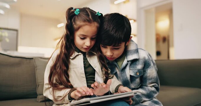 Kids, siblings and tablet in living room to play game, learning and bonding together on weekend. Children, tech and relax at home for educational gaming, puzzle app and click for online development