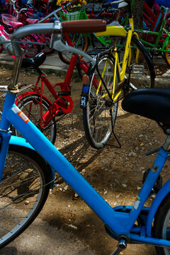 Colorful Bicycles for Rental in Historical Park