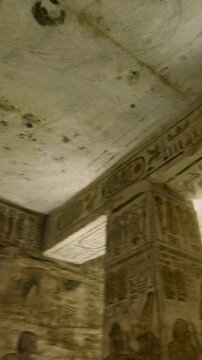 Ancient Egyptian chamber with statues and decorated ceiling inside the Abu Simbel Temple, showcasing sacred architecture, carvings, and timeless spiritual symbolism. Egypt.