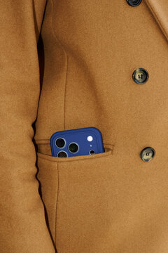 A smartphone in a jacket pocket 