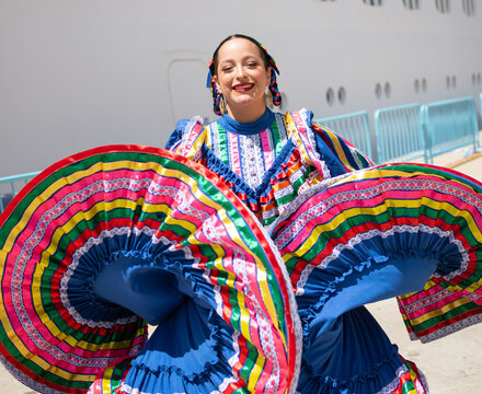 Latin Woman Dancing with Traditional Clothes