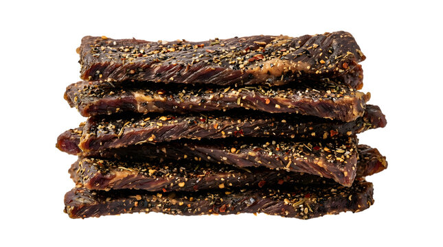 Close up of stacked premium dried beef jerky slices on white background