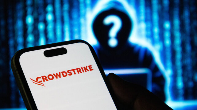 Crowdstrike cybersecurity brand logo displayed on smartphone screen with digital background.