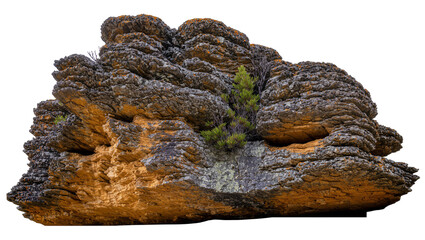 Layered sandstone rock formation with green vegetation © Peregrine