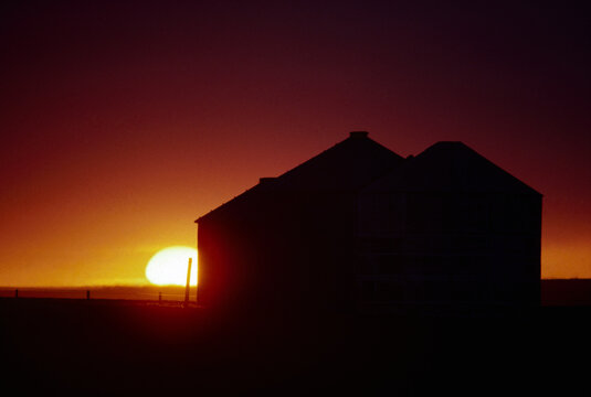 Sunset North Dakota prairies grasslands agricultural grain bins film