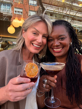 Selfie of two woman on a bar