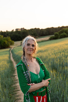 Confident Senior Woman In Field