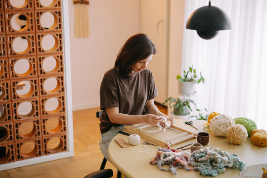  creation of a handmade textile piece.