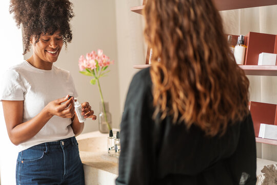 Two Women Trying Skincare Products and Sharing Beauty Tips