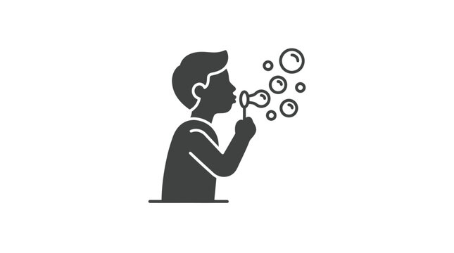 Boy Blowing Bubbles With Bubble Wand.