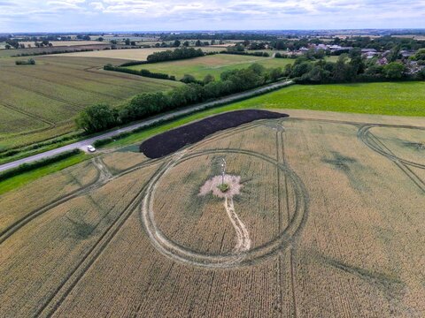 Aerial view of crop circle patterns in a wheat field near Chelveston, England, United Kingdom.