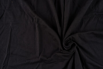 Obraz premium Black Fabric Swirl Background With Texture and Wrinkles for Textile or Product Photography