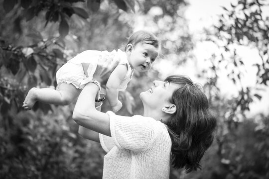 Mother with baby in the garden, Family, Bavaria, Germany