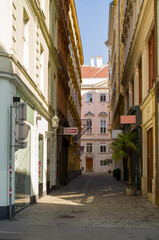 Fototapeta premium Narrow alleyway in historic city.