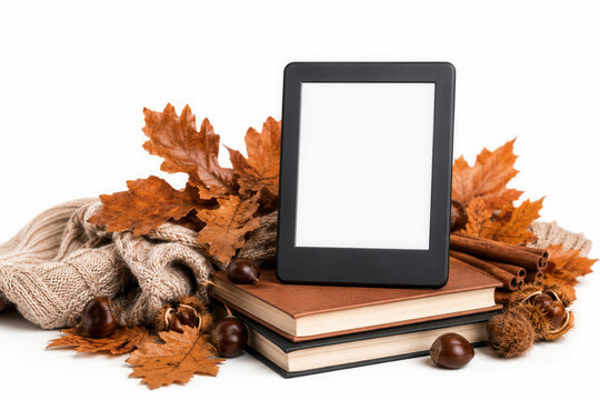 Warm autumn leaves surround a digital reader