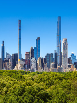 New York City Billionaire's Row supertall skyscrapers in Midtown Manhattan overlooking trees of Central Park (elevated view)