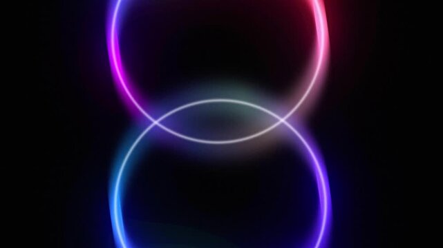 Abstract glowing rings rotating and interloping. Seamless loop animated background with pink, blue, and purple gradients.