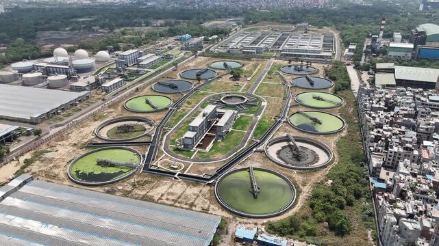 Aerial drone view of large wastewater treatment plant and sewage treatment facility in Delhi India