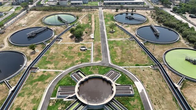 Aerial drone view of large wastewater treatment plant and sewage treatment facility in Delhi India