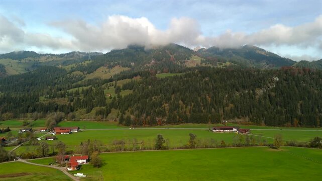 Aerial drone view of the Kesselwand ridge in the Mangfallgebirge mountains near Bayrischzell, Bavaria. Scenic autumn landscape in the Bavarian Prealps, Germany, featuring rugged alpine peaks