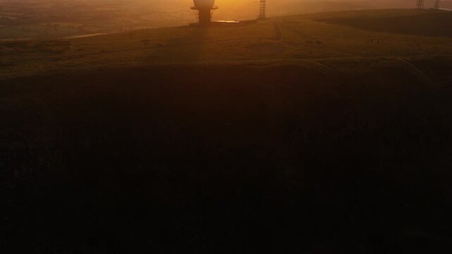 satellite dish at sunrise