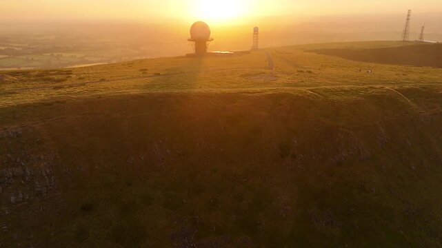 satellite dish at sunrise