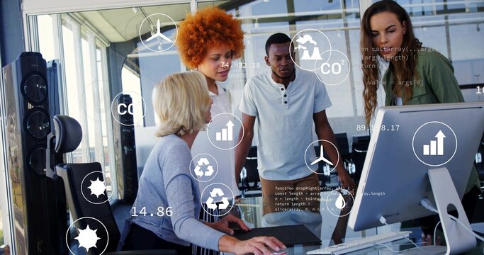 Seated lead manipulating mouse, team reviewing environment data with floating CO2 charts on monitor