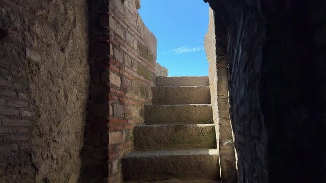 Ancient Vomitorium Exit and Stone Stairs Leading to Seating in Pompeii Amphitheatre