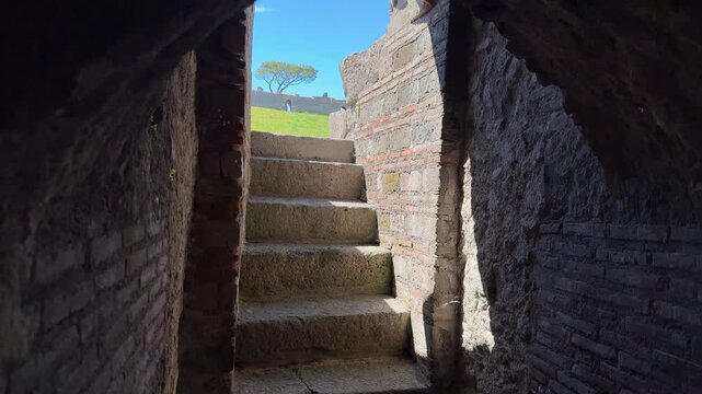 Ancient Vomitorium Exit and Stone Stairs Leading to Seating in Pompeii Amphitheatre