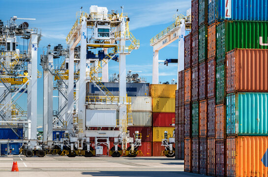 Canada, BC, Delta.  Shipping containers and container cranes at Deltaport, a deepwater port on the Georgia Strait, 35km south of Vancouver.