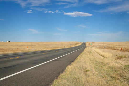 highway in a prairie of eastern COlorado in early spring scenery