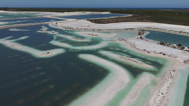 Aerial View of Turquoise Gypsum Evaporation Ponds at Jurien Gypsum Mine Near Sandy Cape Recreation Park, Western Australia