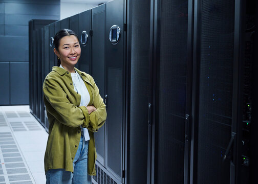 Female IT Professional in Data Center
