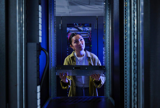 Female Technology Engineer Monitoring Enterprise Servers