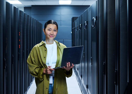 Female IT Professional in Data Center