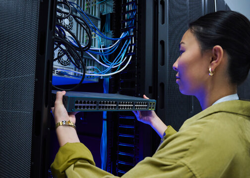 Female Technology Engineer Monitoring Enterprise Servers