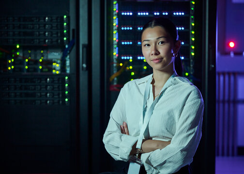 Female IT Professional in Data Center