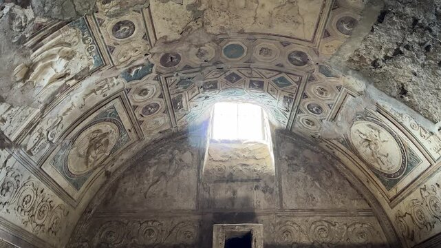 Intricate Stucco Reliefs on the Vaulted Ceiling of Ancient Baths in Pompeii