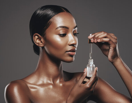 Stunning Young Woman Applying Essential Face Oil for Radiant Glowing Skin