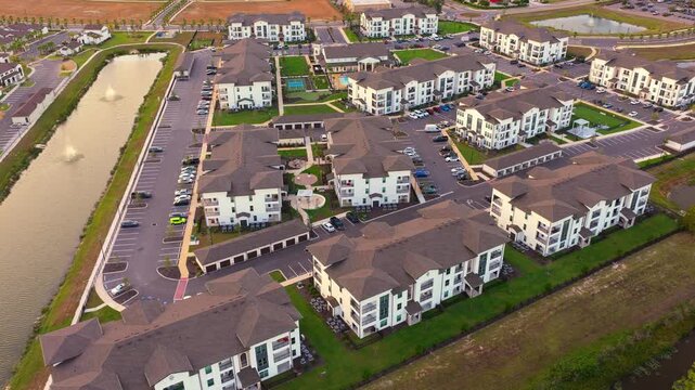 Aerial view of modern suburban neighborhood in Florida with upscale homes. Residential real estate development and peaceful American lifestyle.
