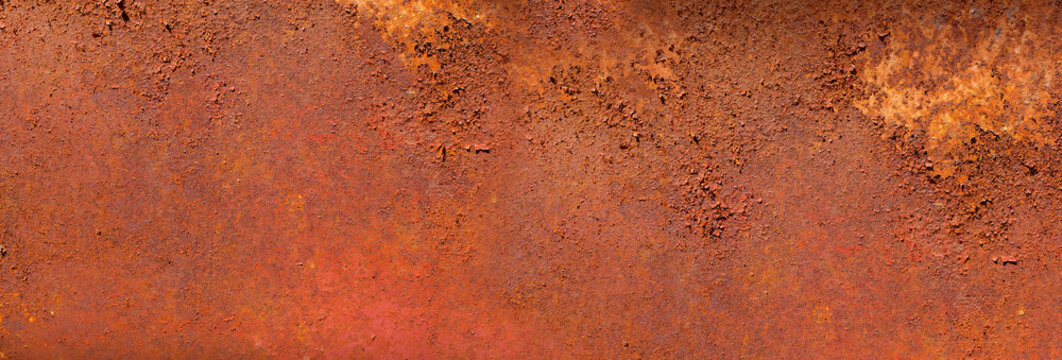 Rust forming on old metal industrial surface