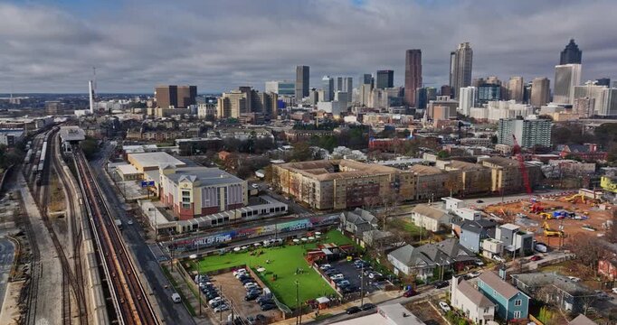 Atlanta Aerial v776 flyover reveal shot capturing cityscape across o4w, downtown and cabbagetown neighborhoods at daytime with beautiful cloudy blue sky - Shot with Mavic 3 Cine - December 2021