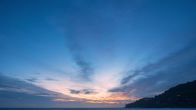 
time lapse the colorful clouds are changing color in sky at sunset above the sea.
Gradient color. Sky texture, abstract nature background.
Sunset with strong color clouds at Karon beach Phuket.