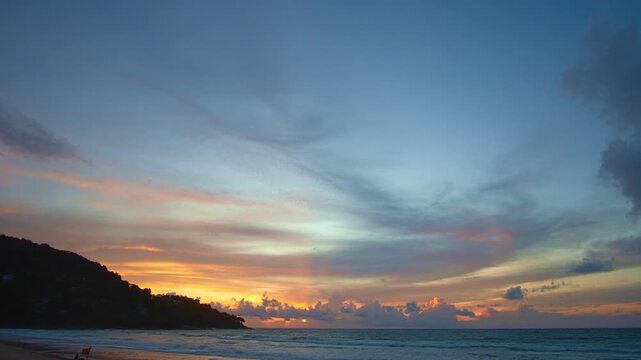 time lapse day to night The rays of the sun shine through the clouds above ocean.
The rays of the sun shine through the clouds at beautiful gradient sunset.
Majestic sunset or sunrise landscape.