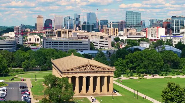 Full-scale reproduction of the ancient Parthenon in Nashville with marble-style columns, classical architecture and scenic park surroundings.
