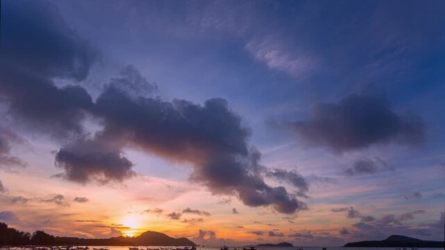 Timelapse stunning the sun shining through the clouds at the horizon.
Scene of colorful yellow light through the clouds above fishing boat.
Gradient color. Sky texture, abstract nature background.