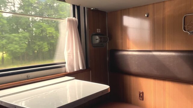 Train compartment interior with motion blur scenery
