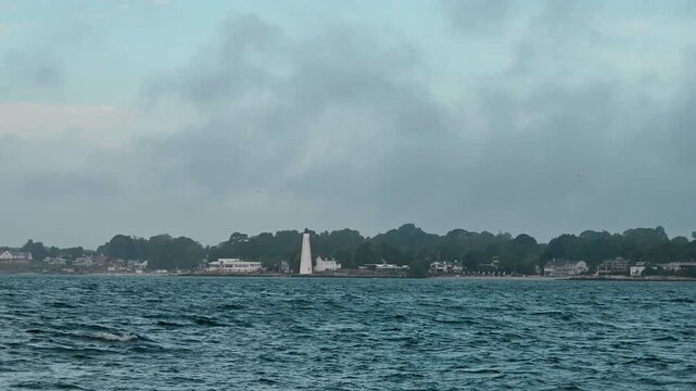 Groton, Connecticut, USA &ndash; Pequot Lighthouse Above Rough Seas At Sunrise